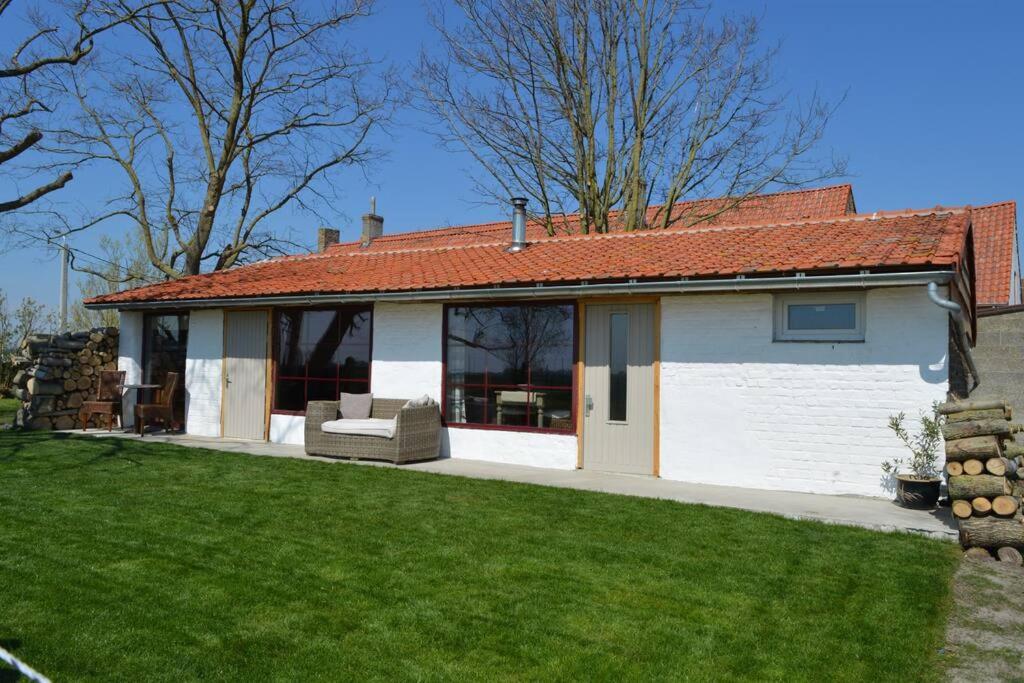 Korentil . Cosy House With Private Garden De Haan Bagian luar foto